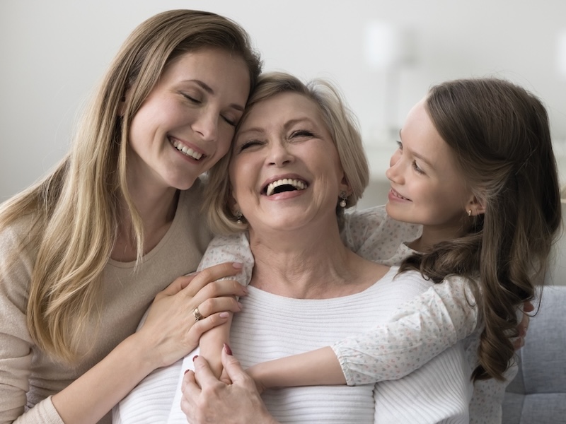 Close multi-generational family at home together