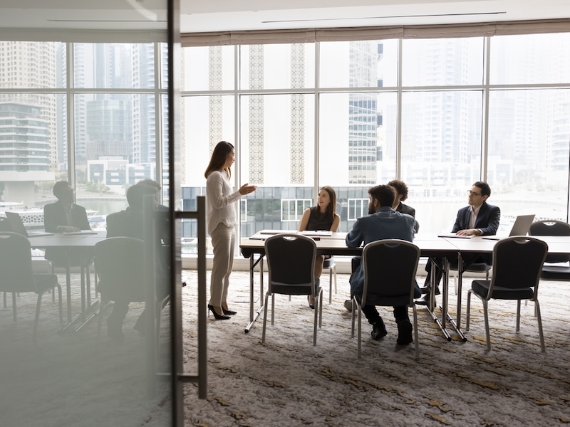 Working mother busy in an important business meeting